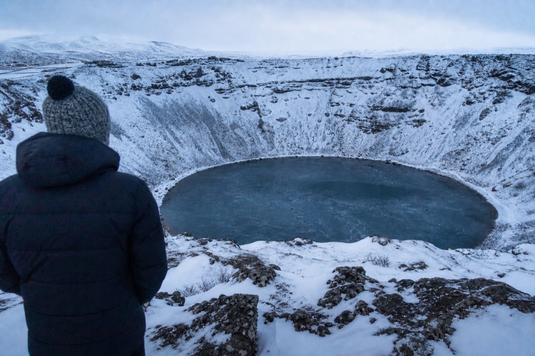 Kerið crater lake rimmed with snow on a full-day Golden Circle winter tour