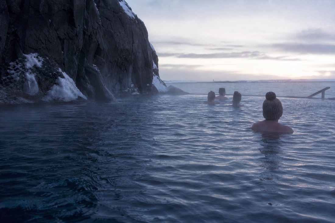 The ocean-edge infinity water of Sky Lagoon looking out over the sea near Reykjavík