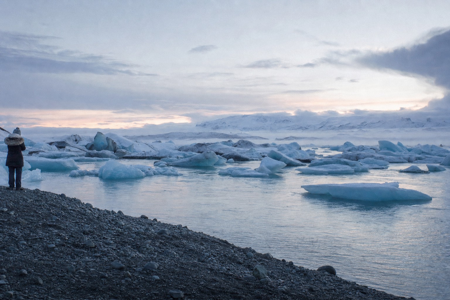 Icebergs drifting in Jökulsárlón glacier lagoon, reached on a multi-day Iceland winter package