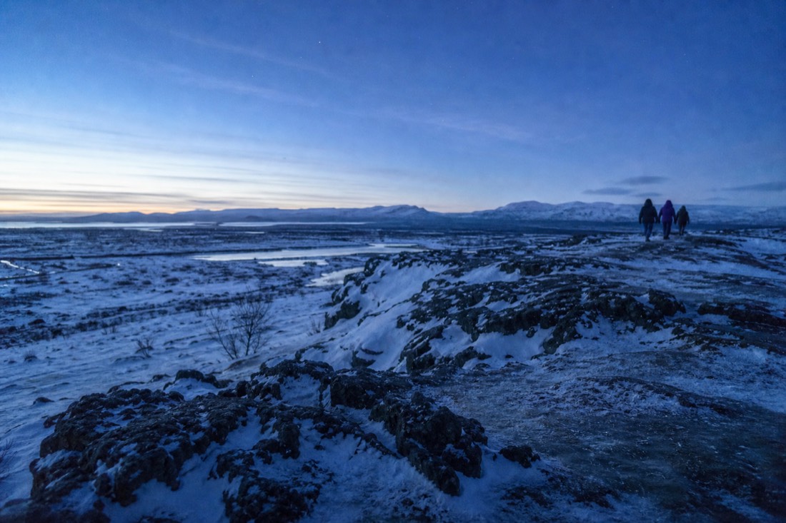 Blue hour over Thingvellir in winter, thin high cloud and the first stars appearing